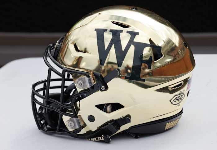 Winston-Salem, North Carolina, USA; A Wake Forest Demon Deacons helmet on the sidelines during the first quarter against the Clemson Tigers at Truist Field